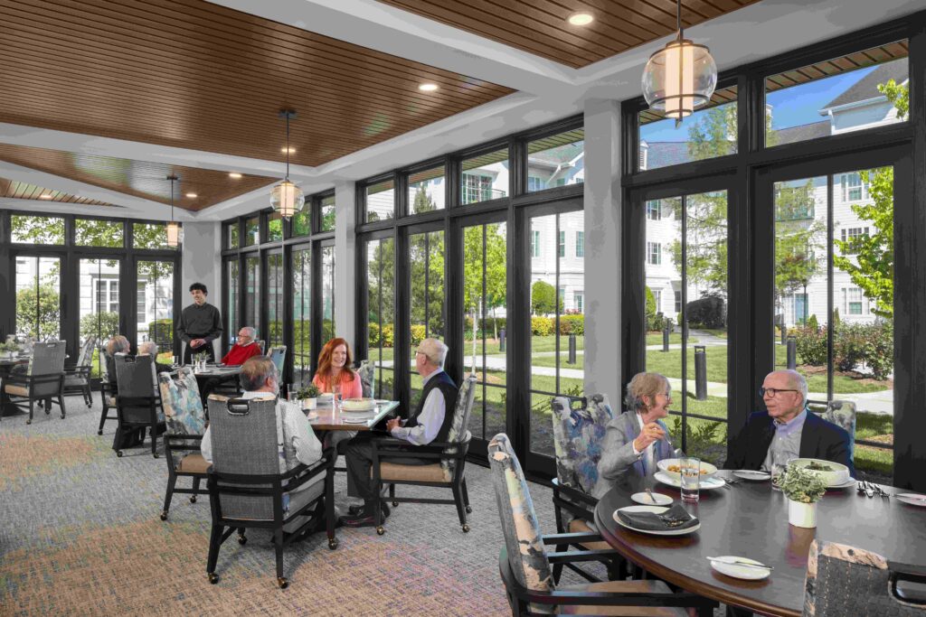 Galloway Ridge - Dining_Photo Int Dining Harvest Solarium 1 w People_Photograph by Andrew Rugge - Copyright Perkins Eastman